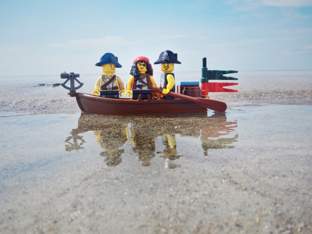 A group of toy explorers along the Emerald Isle coast